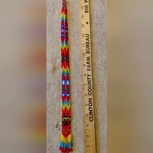 Native American beaded necklace. Red . With yellow blue white black handmade .